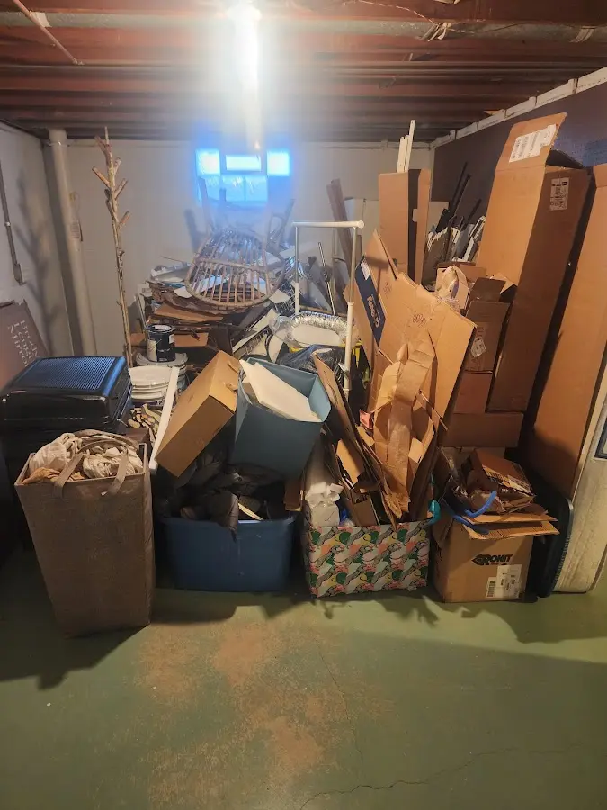 Roll-off dumpster container at job site for Concrete Dumpster Rental in Holmes Beach